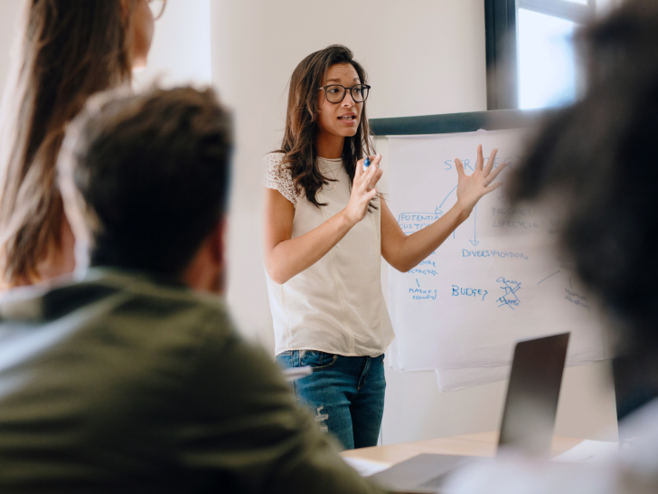 woman presenting to a group