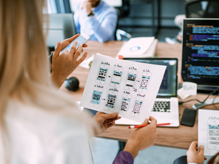 woman looking at solution sketch design