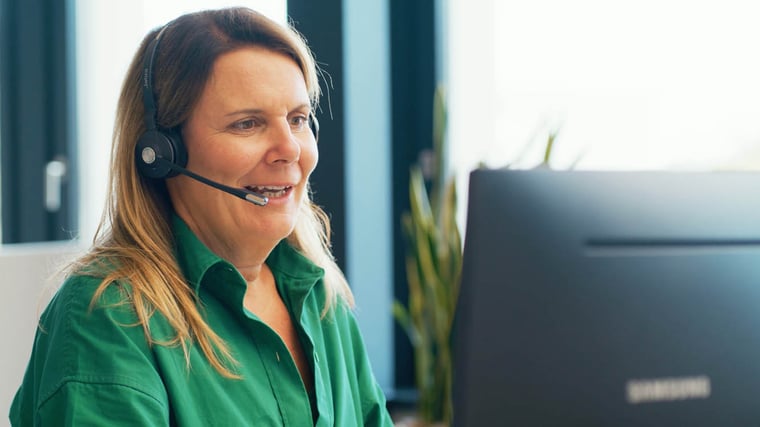 Woman sitting in a call center