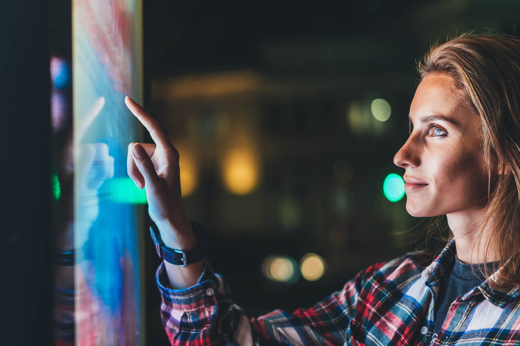 woman_software_engineer_pointing_at_glass_screen