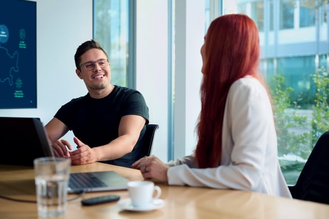 two people having a meeting and talking