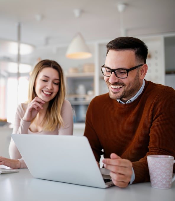 Female work colleague shows something to male work colleague