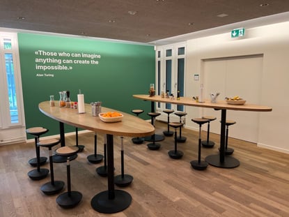 Adnovum meeting room with desk and chairs