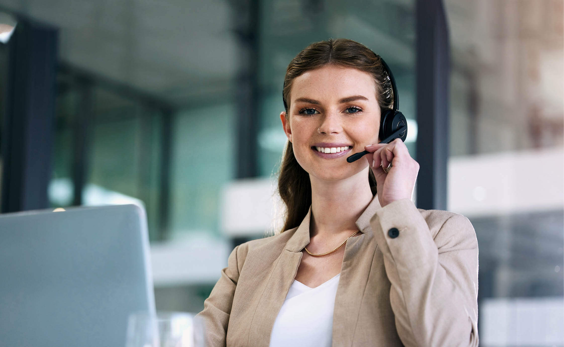 Woman with a headset working in a call center
